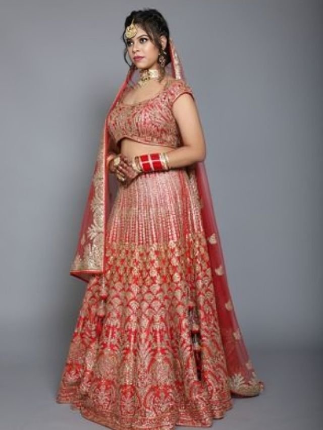 Put Net Dupatta over Head and Keep the One Side Shorter in Length with Lehenga Put Net Dupatta over Head and Keep the One Side Shorter in Length with Lehenga