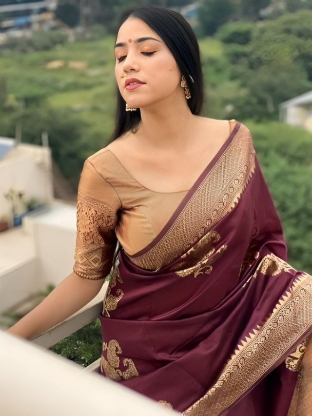 Women Wearing Wine Saree with Gold Blouse