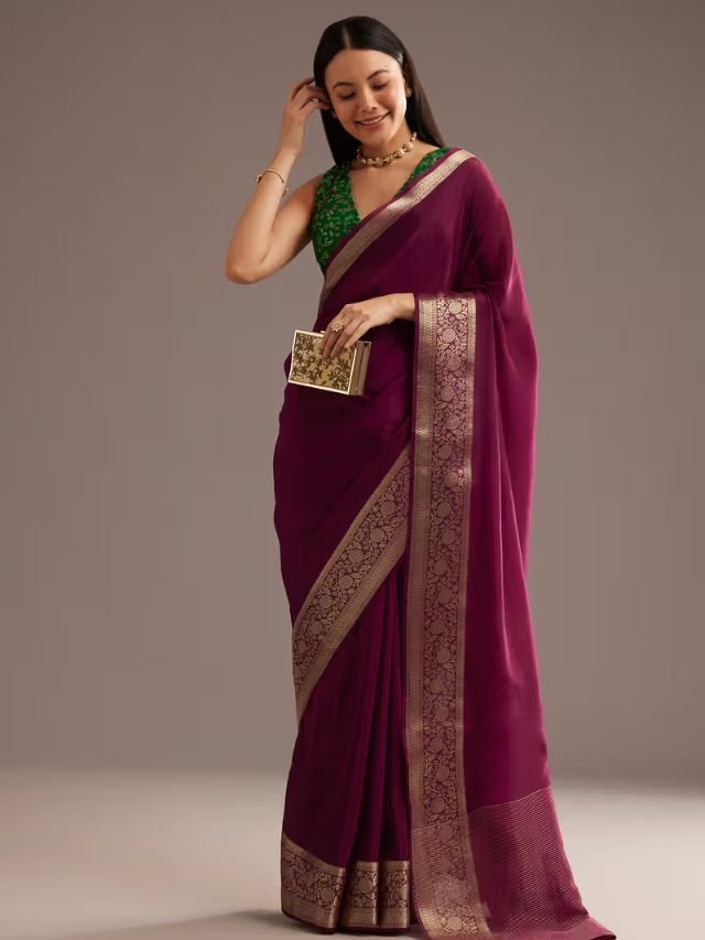 Women in Wine Saree with Peacock Blue Blouse
