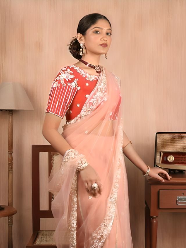 Peach saree with Orange Blouse Peach saree with Orange Blouse