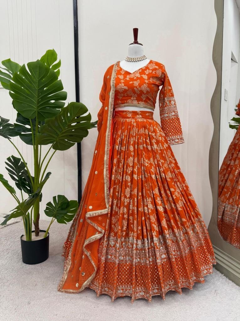 boutique collection jacquard o 1746796560 Boutique Collection Jacquard Orange Sequence Work Lehenga Choli