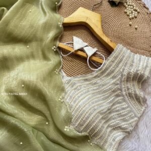 Elegant PearlEmbellished White Blouse with Pastel Green Saree