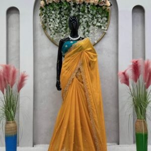 haldi special mustard yellow tebby silk saree with tread and moti work