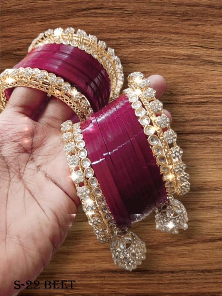 trendy beet color chooda with 1720693740 Trendy Beet Color Chooda With Golden Jhumki Set