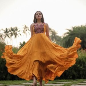 Yellow Color Navratri Gown in Rayon With Gamthi Work and 12 Meter Big Flair